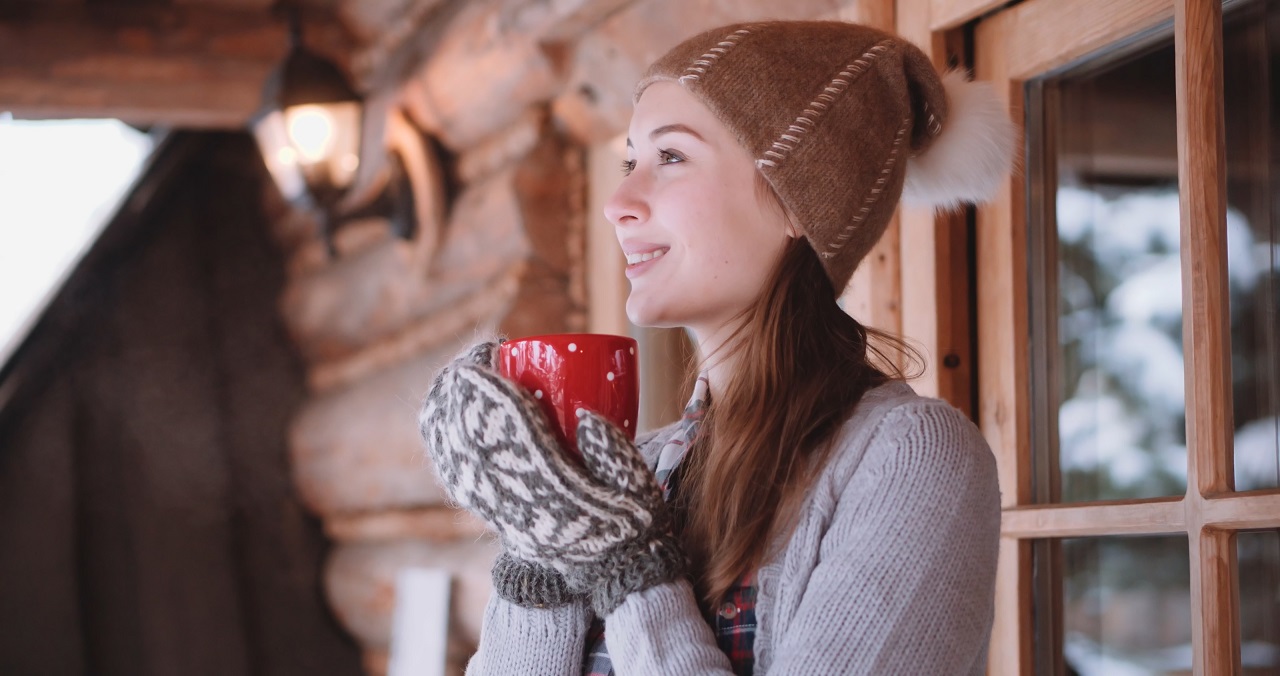 Model enjoying mocha in the cold