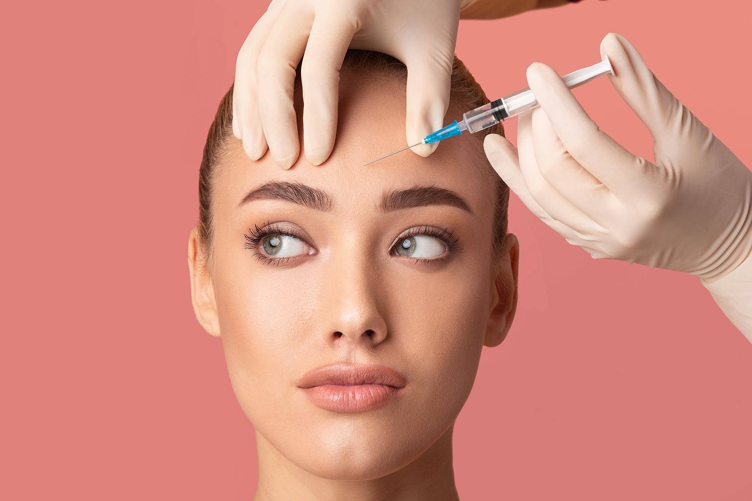 woman getting injectables on forehead